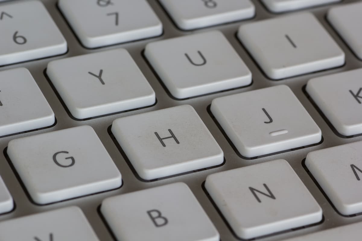 high angle closeup shot white keyboard